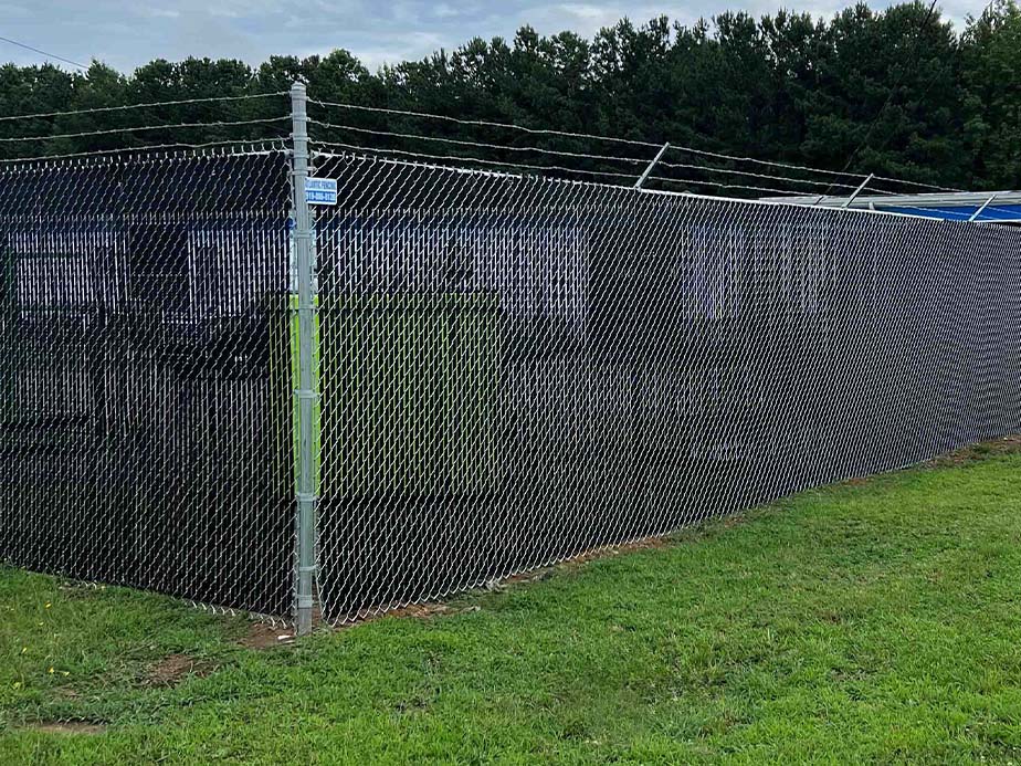 Commercial Chain Link semi-privacy fencing in Youngsville North Carolina